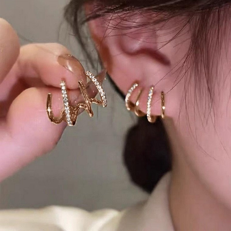 Four Claw Earrings - Silver-Colored Claws with Crystal Accent