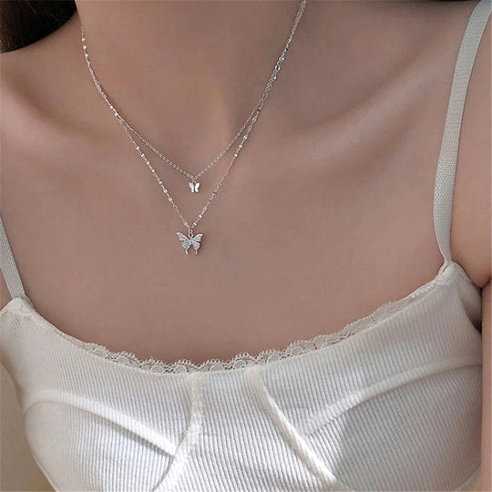 Verfijnde Zilveren Ketting Set met Glanzende Vlinder