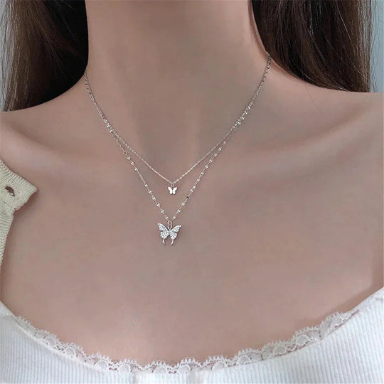 Verfijnde Zilveren Ketting Set met Glanzende Vlinder