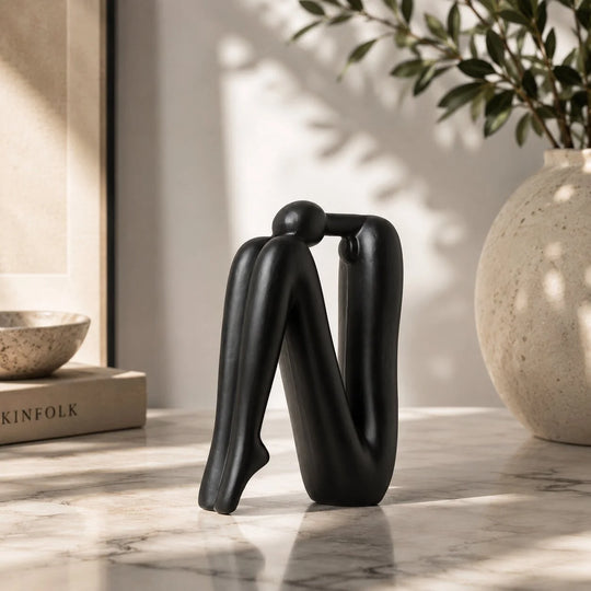 Boekensteunen – Sculpturaal Porselein voor de Boekenkast
