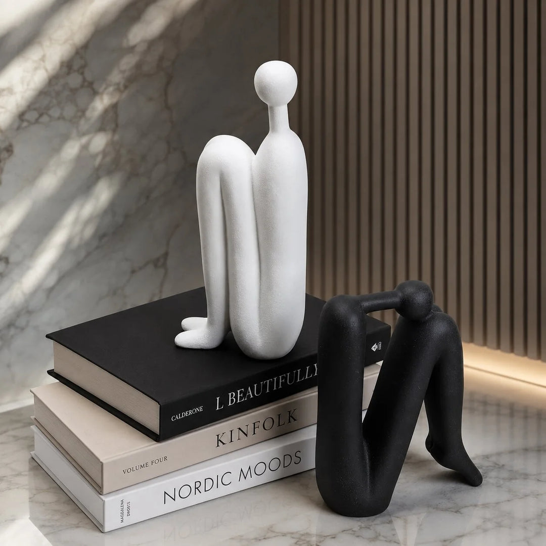 Boekensteunen – Sculpturaal Porselein voor de Boekenkast