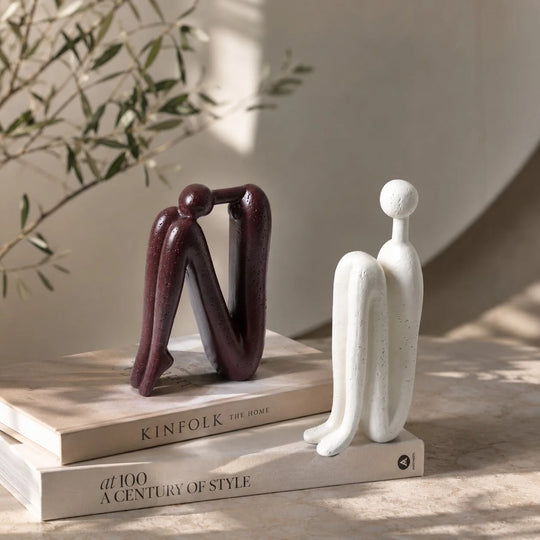 Boekensteunen – Sculpturaal Porselein voor de Boekenkast