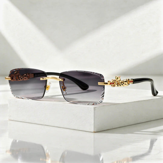 Zonnebril Randloos – Facetglazen met Gouden Panter-detail, UV400