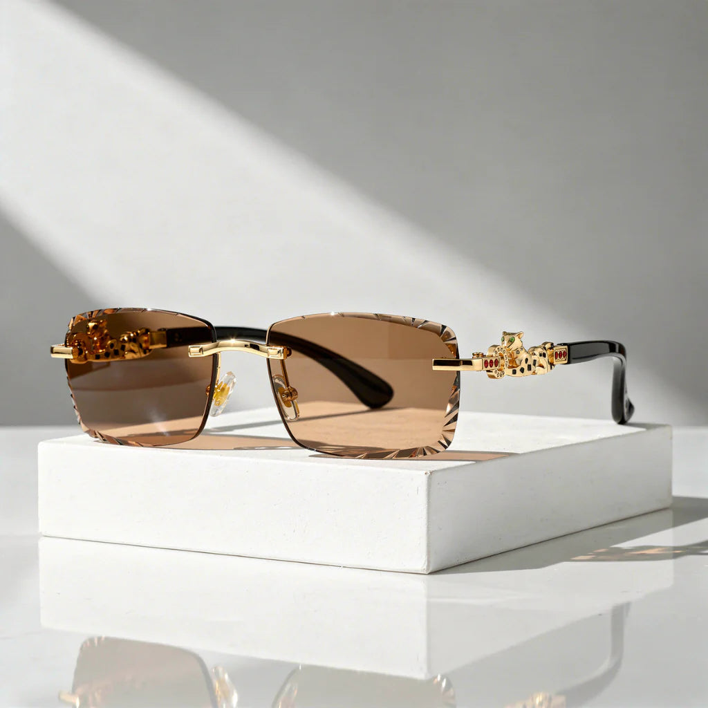 Zonnebril Randloos – Facetglazen met Gouden Panter-detail, UV400